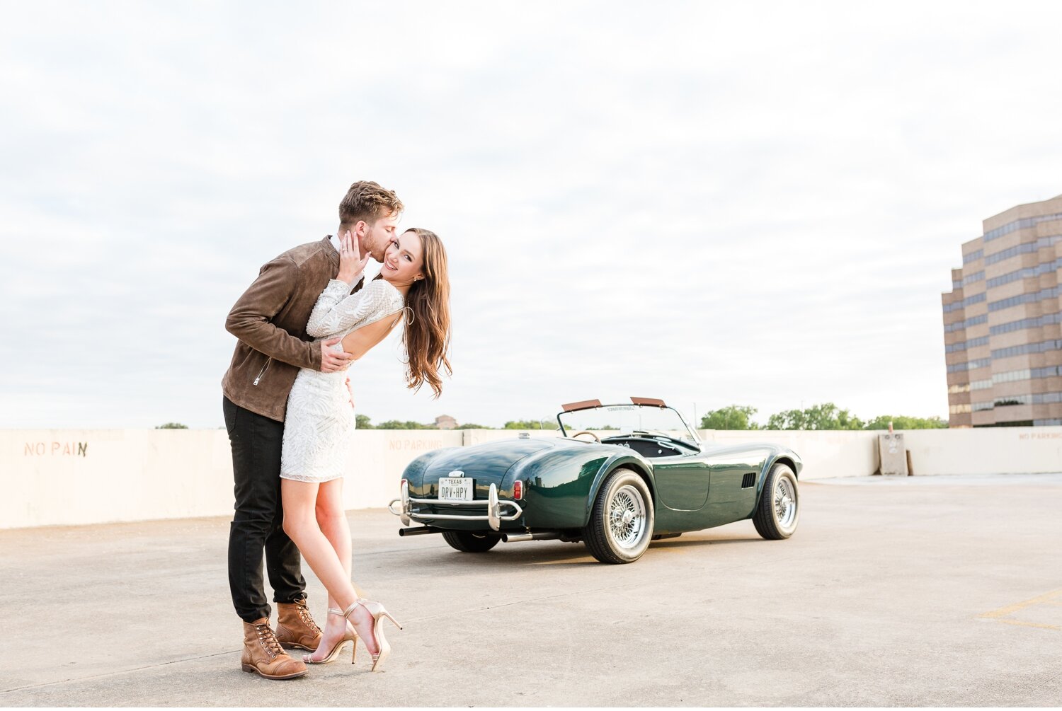 London + Christian Downtown Austin Rooftop Classic Car Engagement Session_0021.jpg