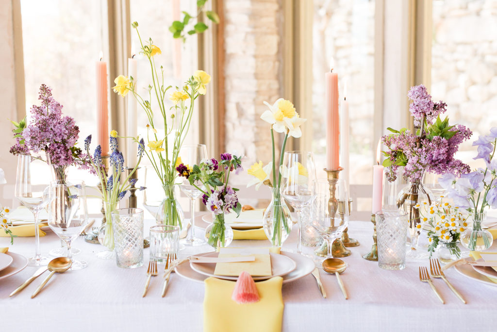 tabletop centerpieces photo at villa antonia, one of the best austin wedding venues. 