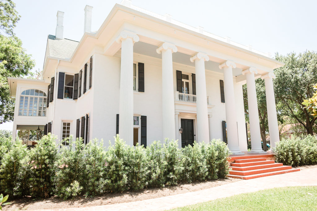 An exterior photo of woodbine mansion, one of the best austin wedding venues. 